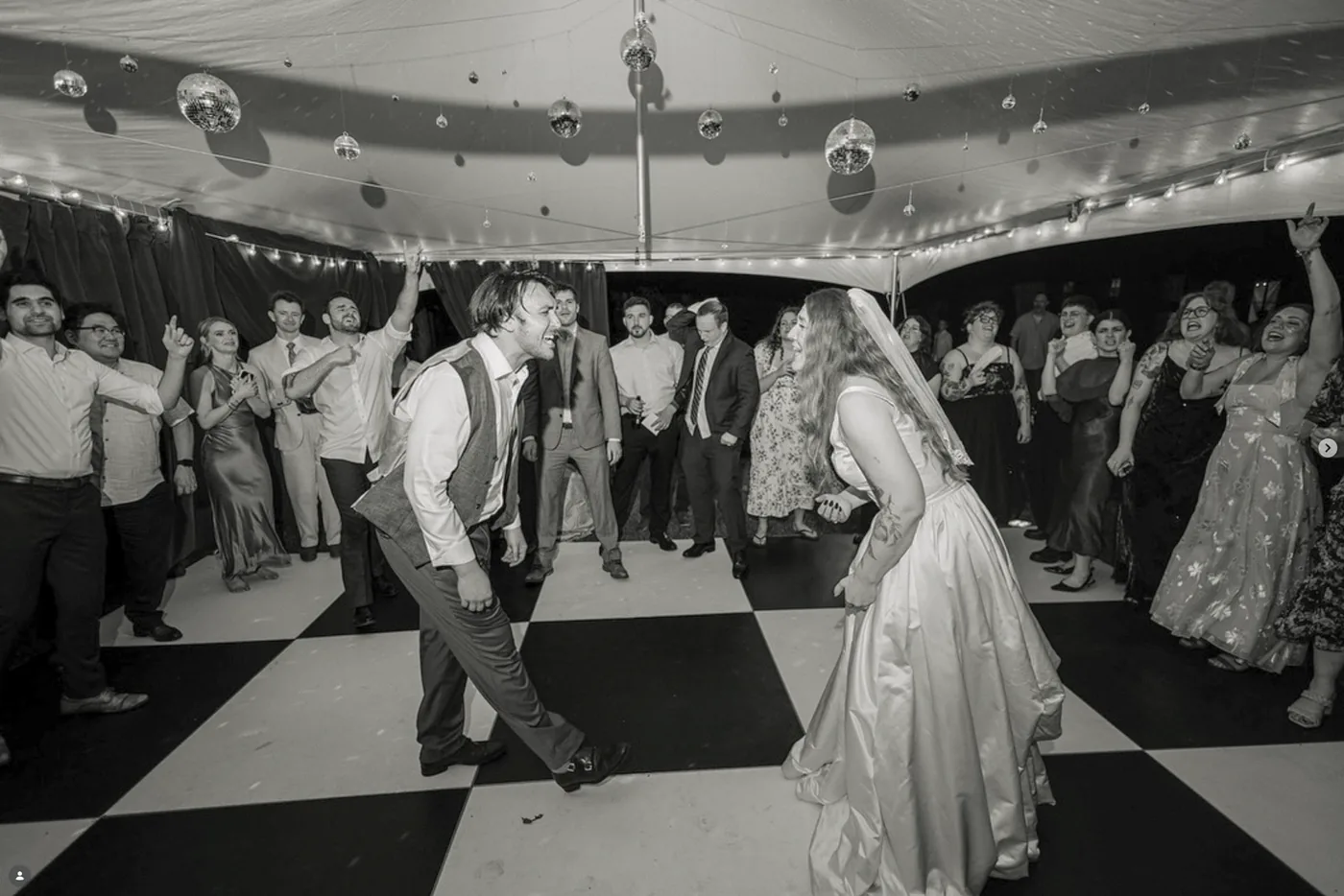 Bride and groom share a last dance at their wedding reception