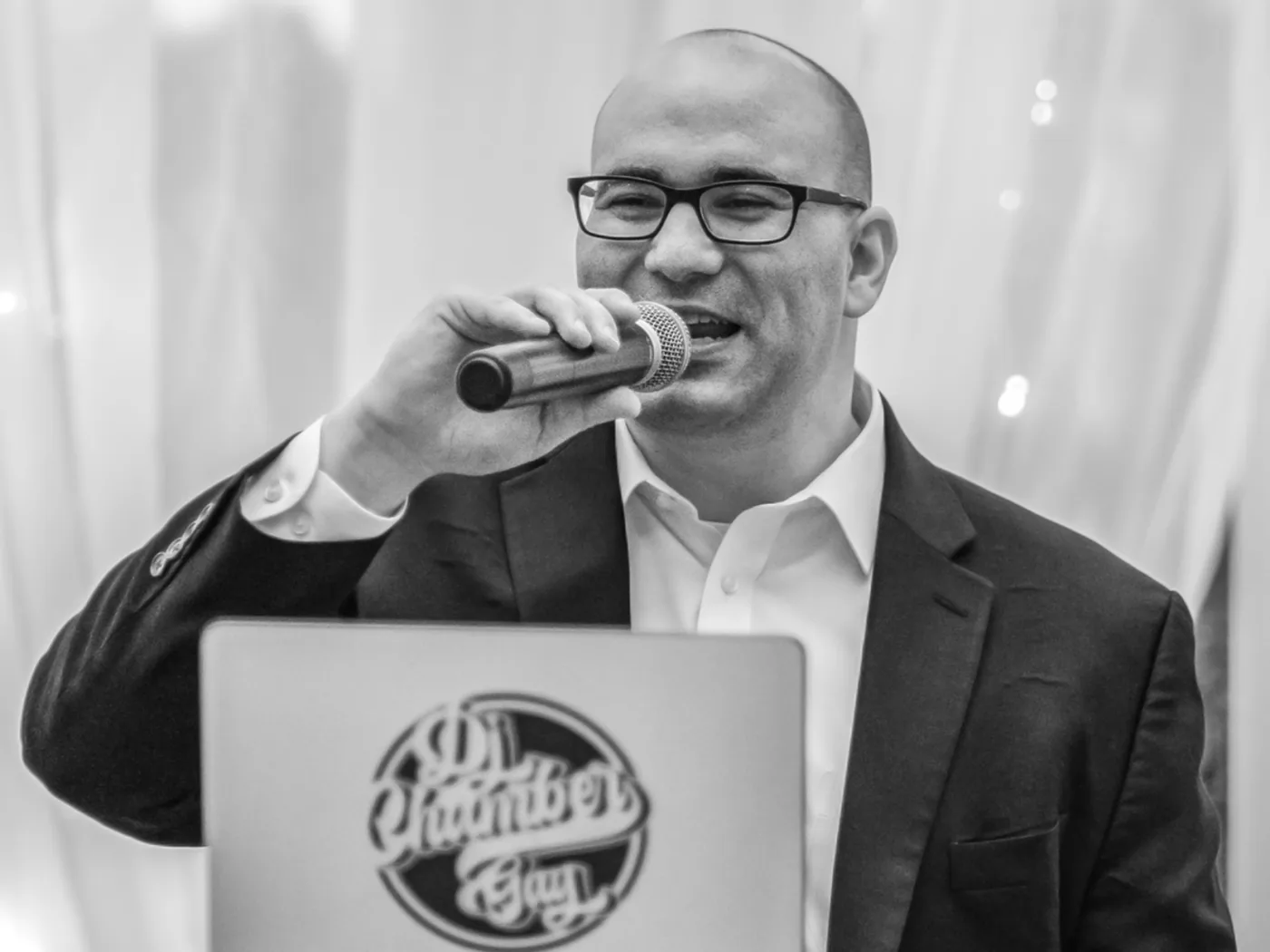 Kyle on the microphone at a wedding