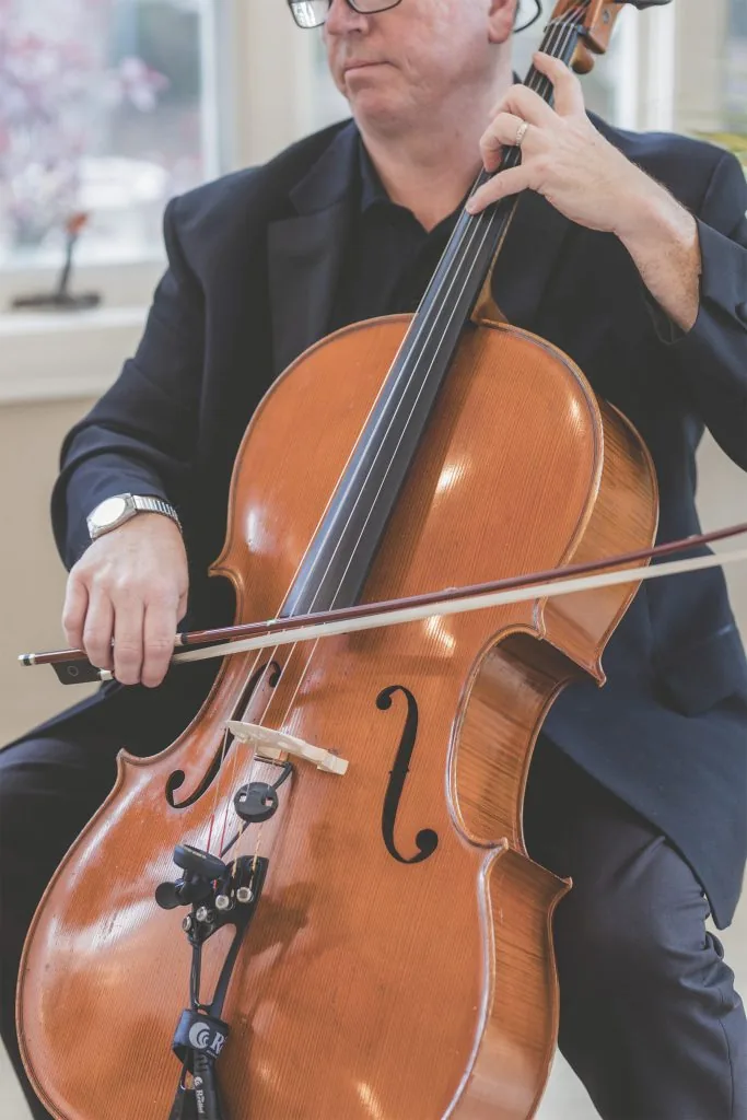 Cellist playing at a wedding ceremony