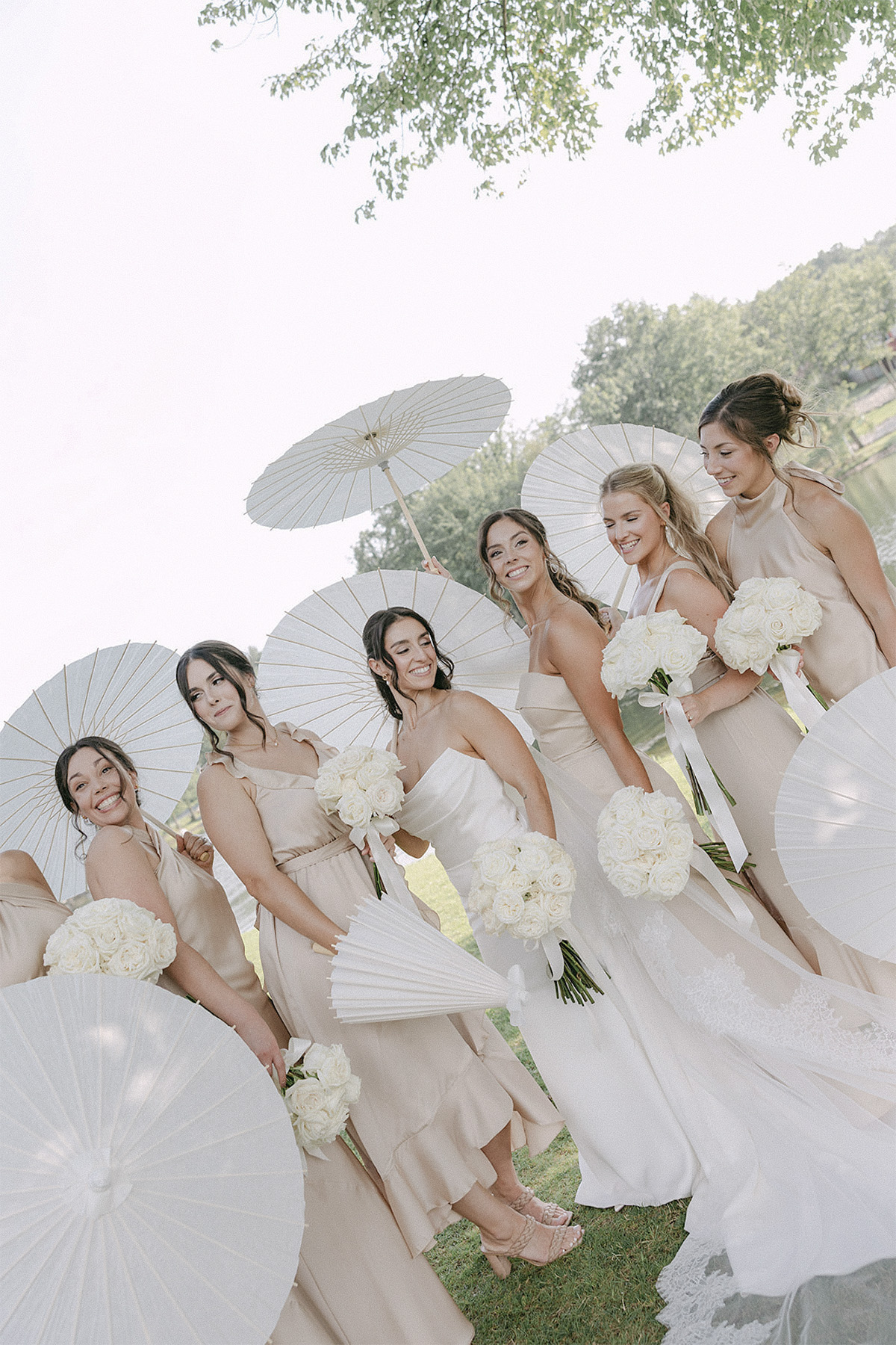 Elegant Wedding Party | VARA DJs Bride and bridesmaids gather for wedding portraits before an unforgettable wedding reception with professional DJ and MC services by VARA DJs.