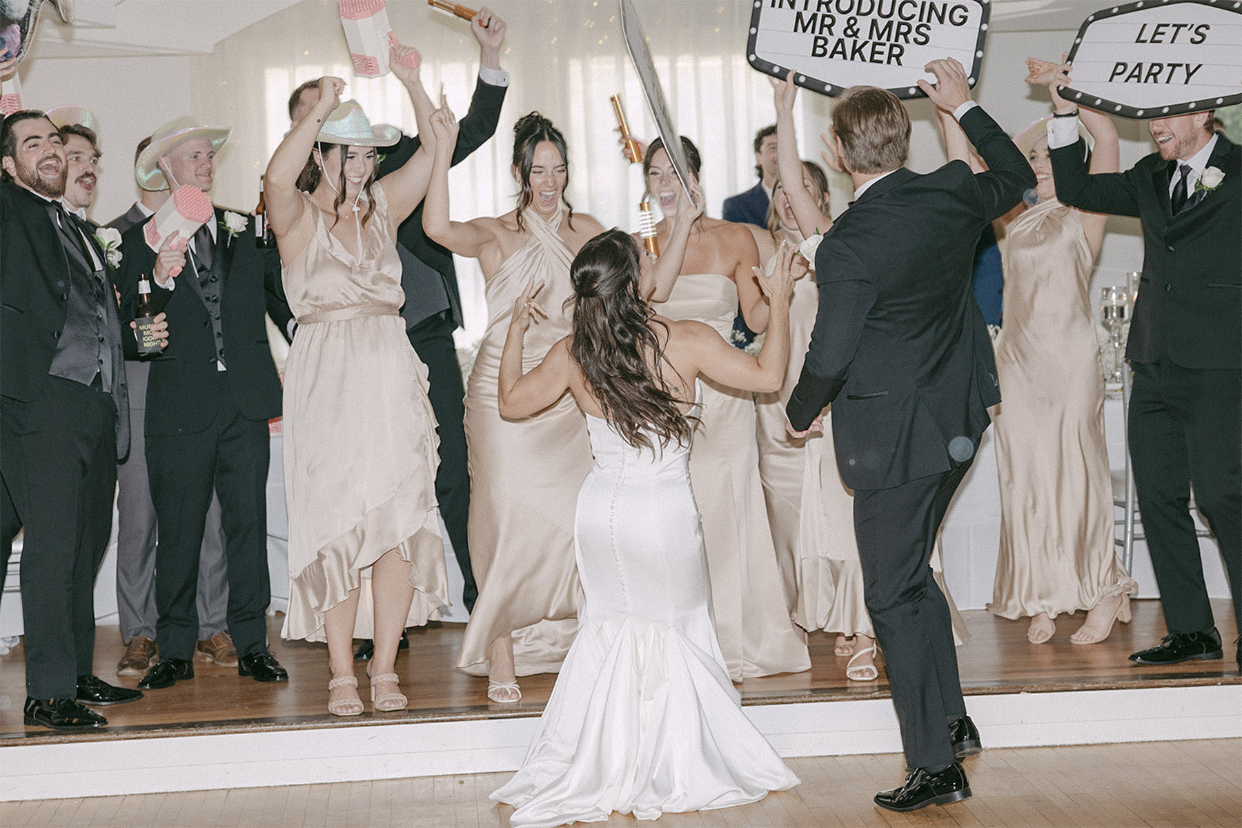 The talented entertainers at VARA DJs engaging wedding guests and creating unforgettable moments during a lively wedding reception.